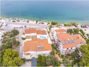 Apartmány Krusica Arbanija (Ciovo), Rozloha 40,00 m2, Ubytovanie s bazénom, Vzdušná vzdialenosť od mora 30 m
